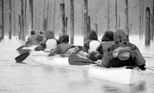 PADDLING IN THE RAIN: Admittedly, things aren't always perfect for local schools'outdoors programs, but no student has ever melted!